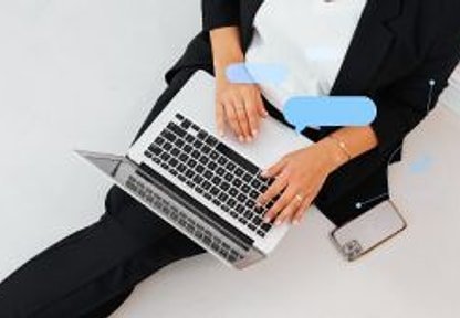Team member working on a laptop